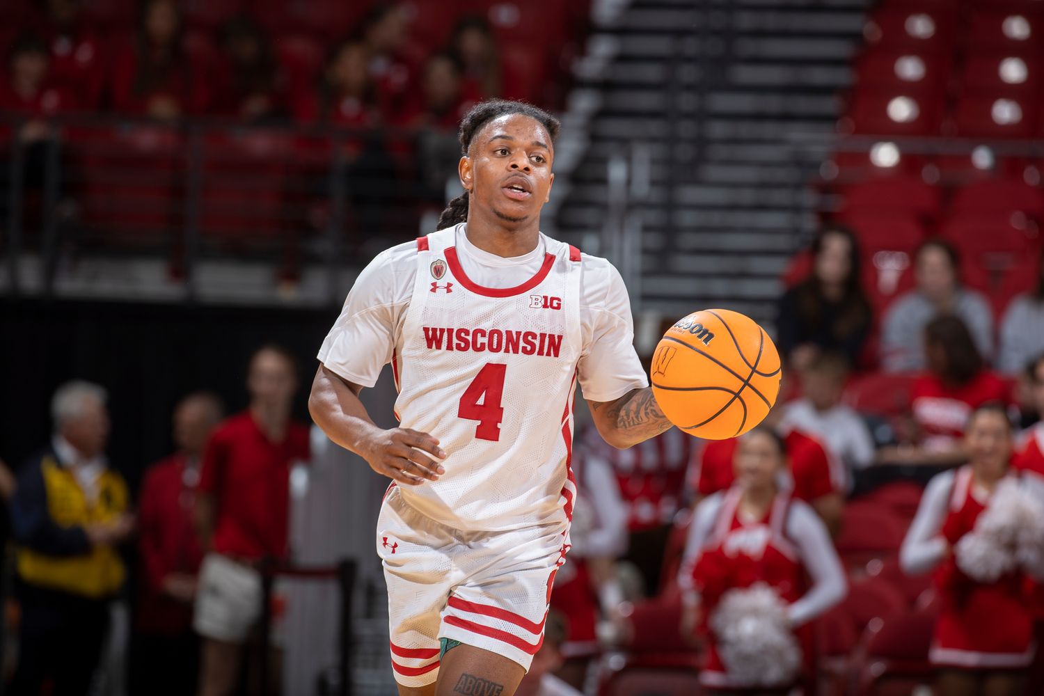 Wisconsin guard Kamari McGee bringing the ball up the court for the Badgers during a scrimmage.